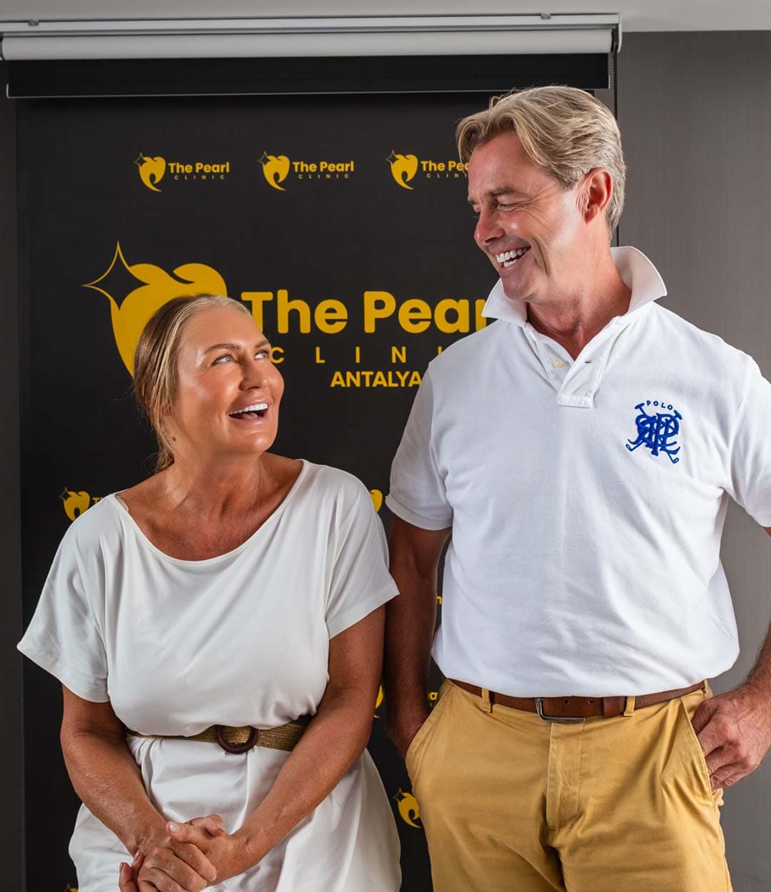 The Pearl Clinic Antalya dentist with patient and assistant smiling together